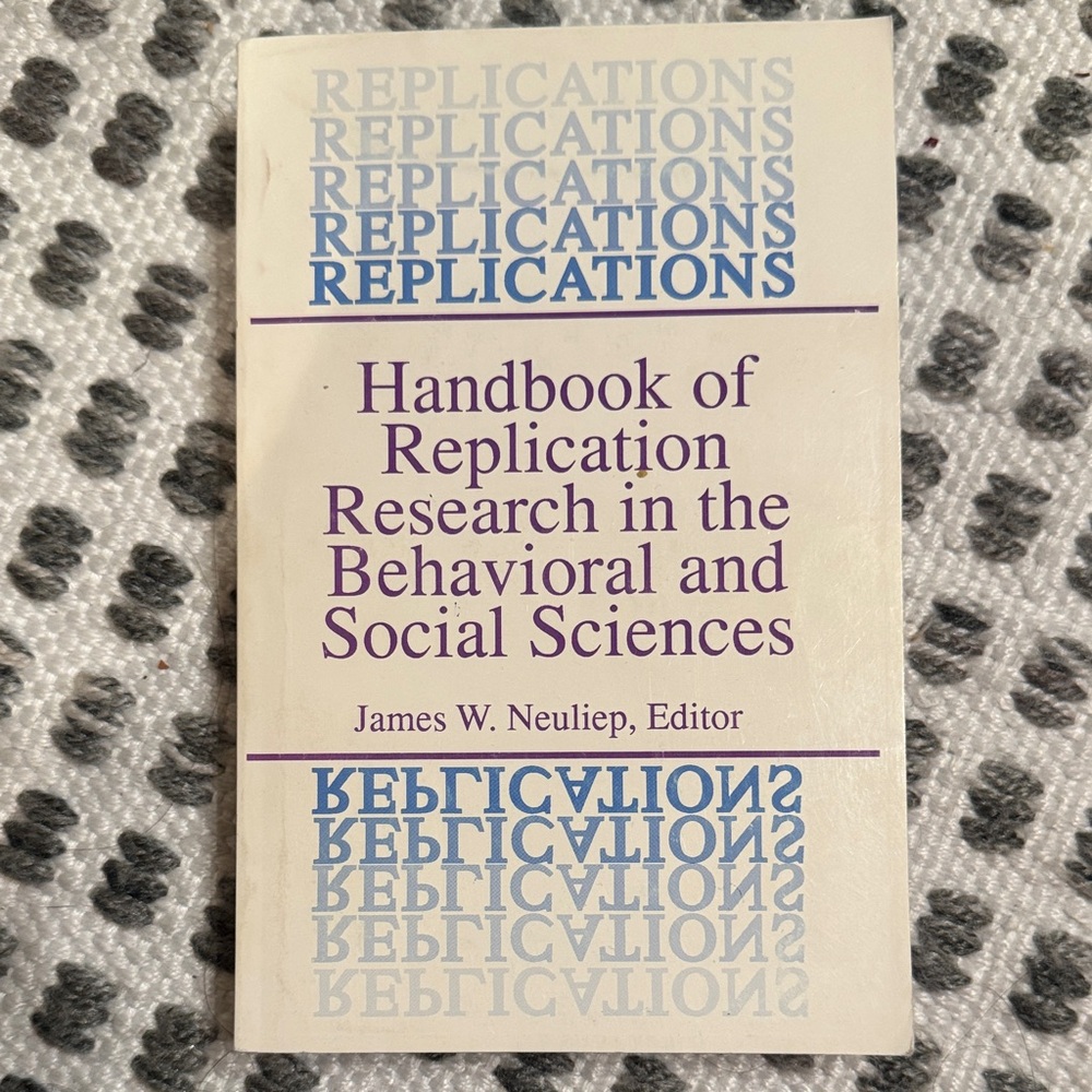 Text-Back Paperback Book - Cream Cover with Purple Text